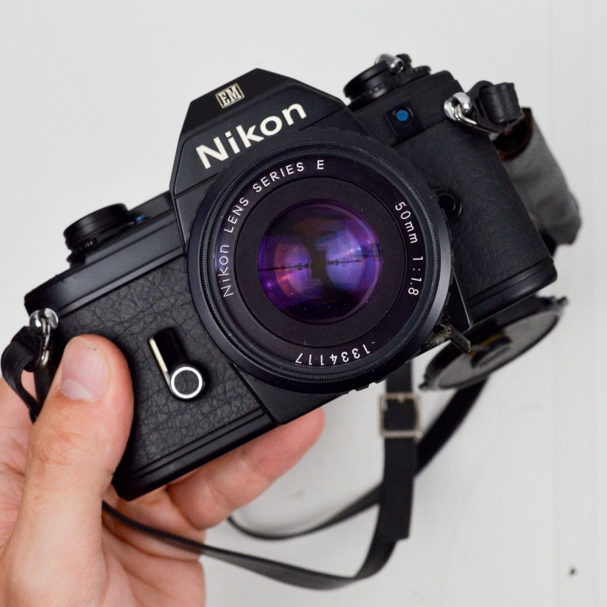 Nikon EM 35mm Film Camera with Nikon Series E 50mm 1:1.8 Lens