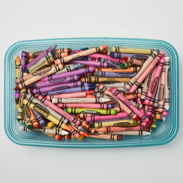 Crayons in Blue Plastic Container