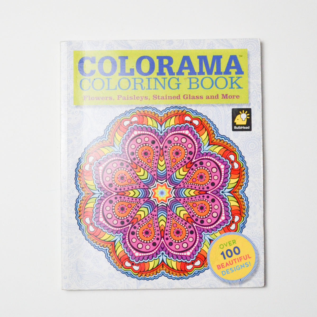 adult coloring book by colorama with colored pencils & 100 designs