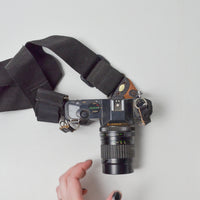 Canon T-50 35mm SLR Camera Body with Sakar Telephoto 135mm 1:2.8 Lens