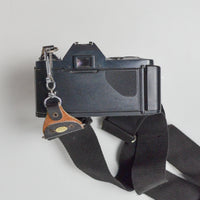 Canon T-50 35mm SLR Camera Body with Sakar Telephoto 135mm 1:2.8 Lens
