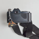 Canon T-50 35mm SLR Camera Body with Sakar Telephoto 135mm 1:2.8 Lens