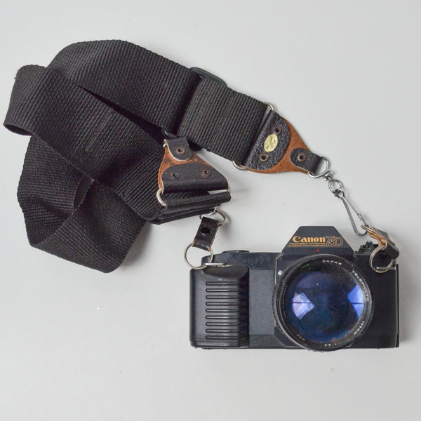 Canon T-50 35mm SLR Camera Body with Sakar Telephoto 135mm 1:2.8 Lens