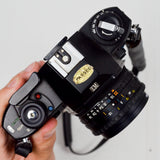 Nikon EM 35mm Film Camera with Nikon Series E 50mm 1:1.8 Lens
