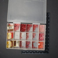 Red Needlework Seed Beads in Clear Compartment Case