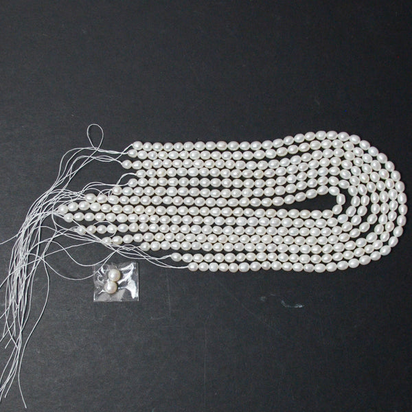 Ivory Rice Oval Freshwater Pearl Beads - 7 Strands