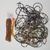 Assorted Black + Brown Strings of Beads