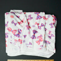 Purple + Pink Bow Print Soft Knit Apparel Fabric - 60" x 100"