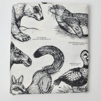 Extinct + Endangered Animal Print Stain Repellant-Coated Woven Fabric - 50" x 96"