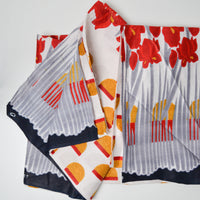 Black, Gray, Red + Yellow Floral Wax Print Woven Fabric - 45" x 90"
