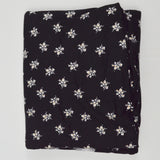 Black + White Floral Print Stretchy Knit Fabric with Sparkly Gold Accents - 64" x 96"