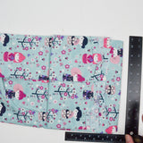 Light Blue, White, Pink + Purple Japanese Kokeshi Doll Print Quilting Weight Woven Fabric - 44" x 51"