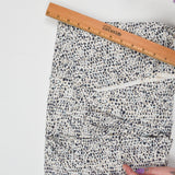 Beige, Black + White Speckle Print Synthetic Stretch Knit Fabric - 66" x 84"