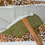 Brown, White, Black + Green Abstract Spot Print Synthetic Twill Woven Fabric - 56" x 148"