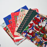 Christmas Print Cut Quilting Weight Woven Fabric Bundle - 10.5" Squares + Additional Panels
