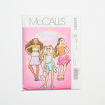 McCall's M5091 Girls Tops, Armbands, + Skirts Sewing Pattern Size CH (7-10)