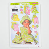 Butterick B5624 Infants' Dress, Jumper, Romper, Jumpsuit, Panties, Pants, Hat and Bag Sewing Pattern - Size Large