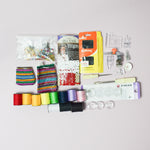 Assorted Thread, Bobbins + Sewing Machine Feet