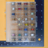 Metal Bobbins with Colorful Thread in Organizing Case