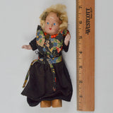 Blonde Doll in Black Dress