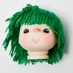 Green Hair Doll Head