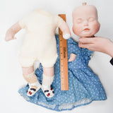 Bell Ceramics Multi-Faced Baby Doll - One Broken Hand