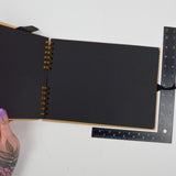 Brown Notebook with Blank Black Pages