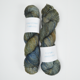 Green + Blue Variegated East Coast Yarn Co. Wanderlust Fingering Weight Superwash Merino Wool + Nylon Yarn - 2 Skeins