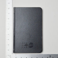 Black UNFPA Embossed Cover Blank Notebook Default Title